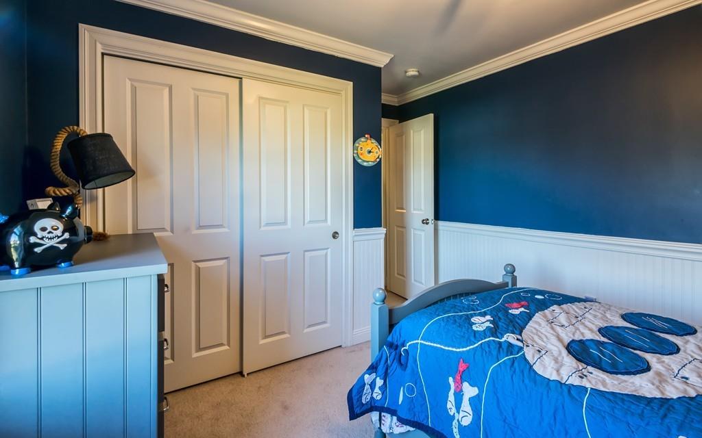 10 Intervale Road Marblehead, MA 01945 - Photo 19 of 32 a bedroom with a bed and a window