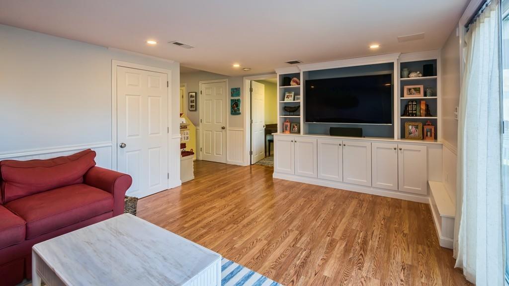 10 Intervale Road Marblehead, MA 01945 - Photo 22 of 32 a living room with furniture and a flat screen tv