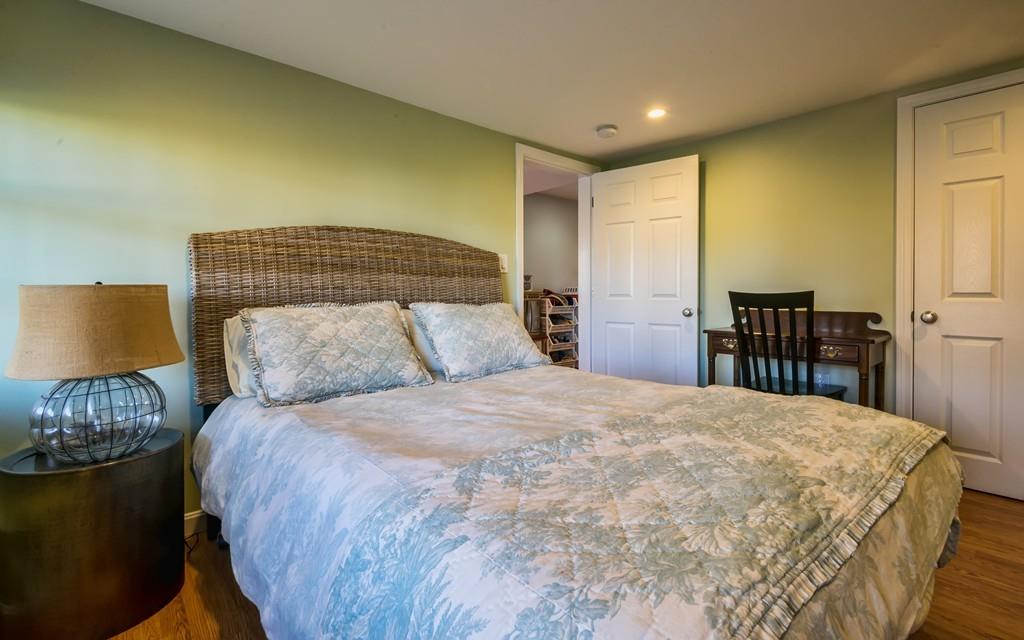 10 Intervale Road Marblehead, MA 01945 - Photo 24 of 32 a bedroom with a bed and table chair
