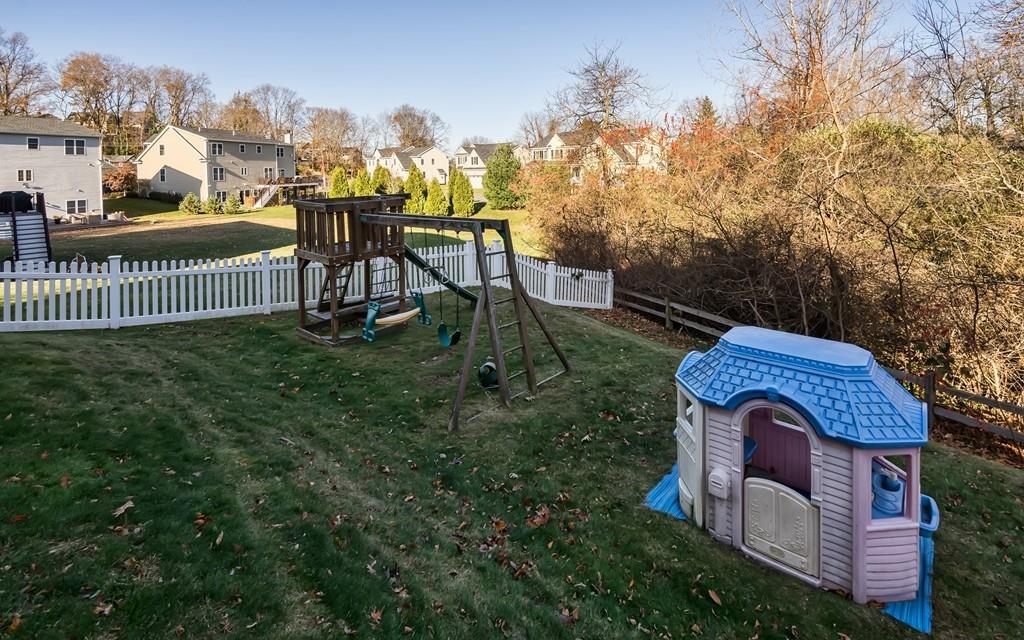 10 Intervale Road Marblehead, MA 01945 - Photo 29 of 32 a view of houses with a yard and slide