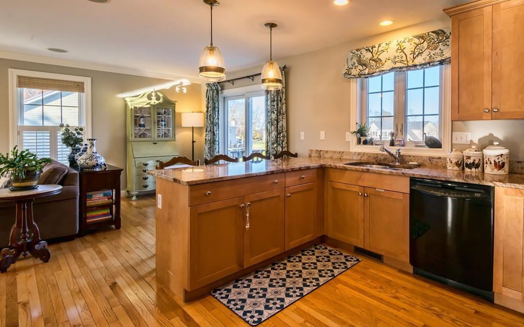 10 Intervale Road Marblehead, MA 01945 - Photo 6 of 32 a kitchen with a sink stove and cabinets