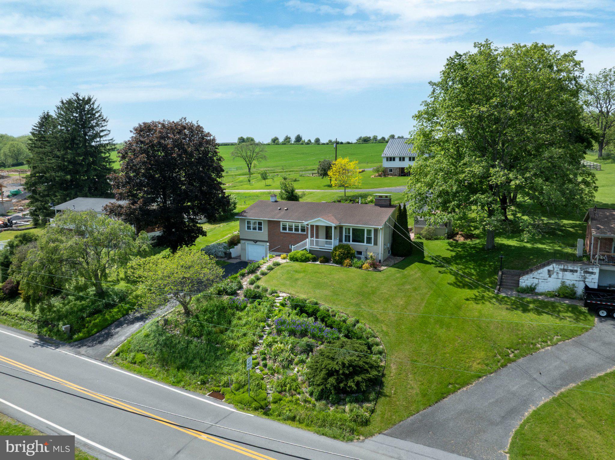1639 Houserville Road State College, PA 16801 - Photo 53 of 54 Charming home with lush greenery.