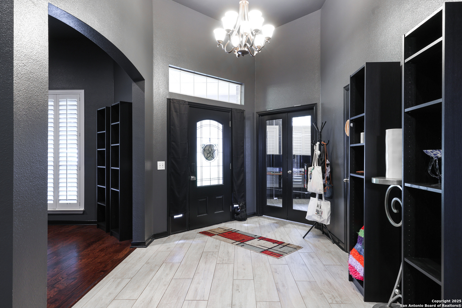 1615 Lookout Point San Antonio, TX 78260 - Photo 2 of 38 a bed room with a bed and a mirror