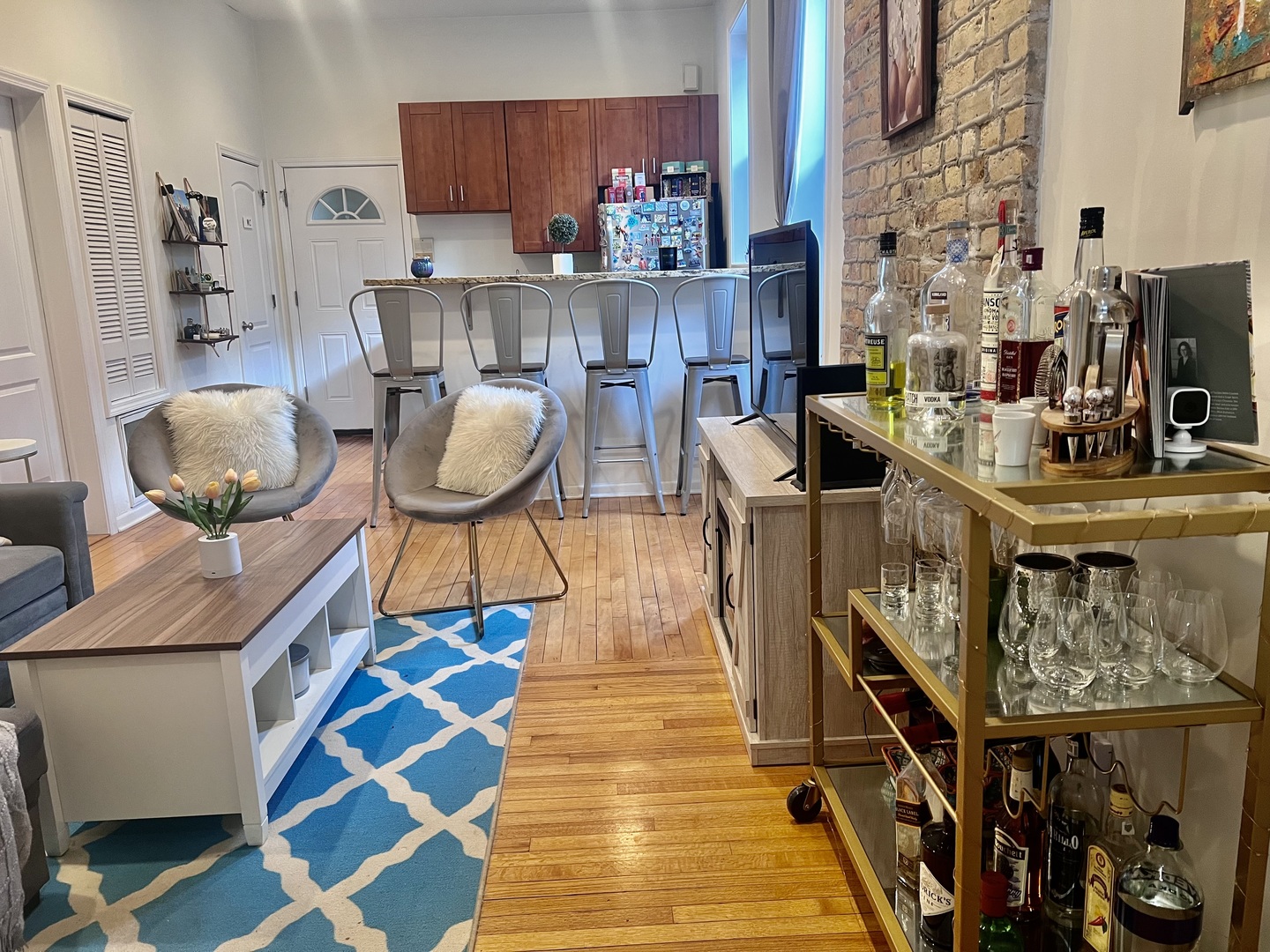 1421 West Huron Street, Unit 2R Chicago, IL 60642 - Photo 4 of 19 a living room with furniture and wooden floor