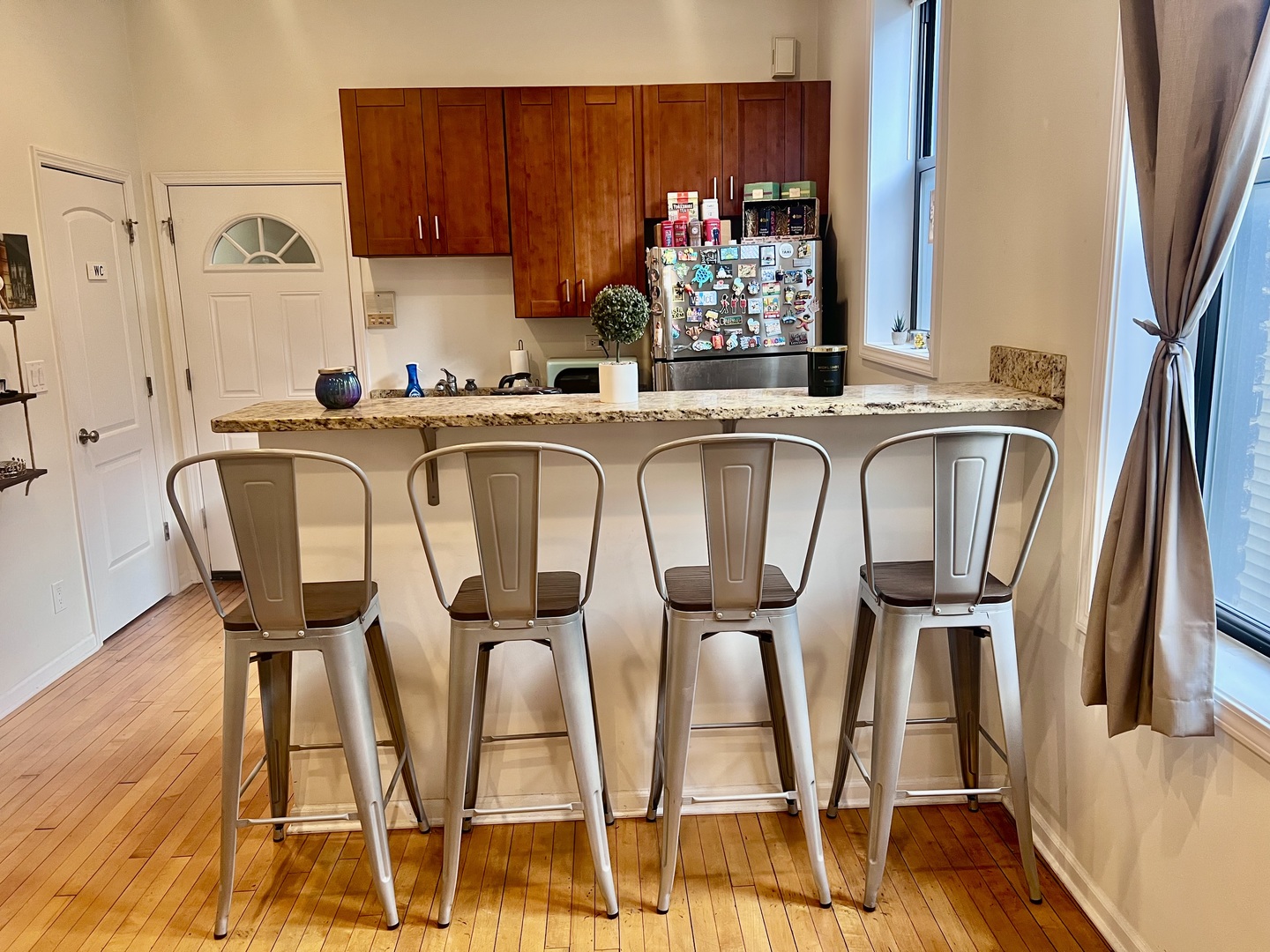 1421 West Huron Street, Unit 2R Chicago, IL 60642 - Photo 6 of 19 a dining area with furniture and wooden floor