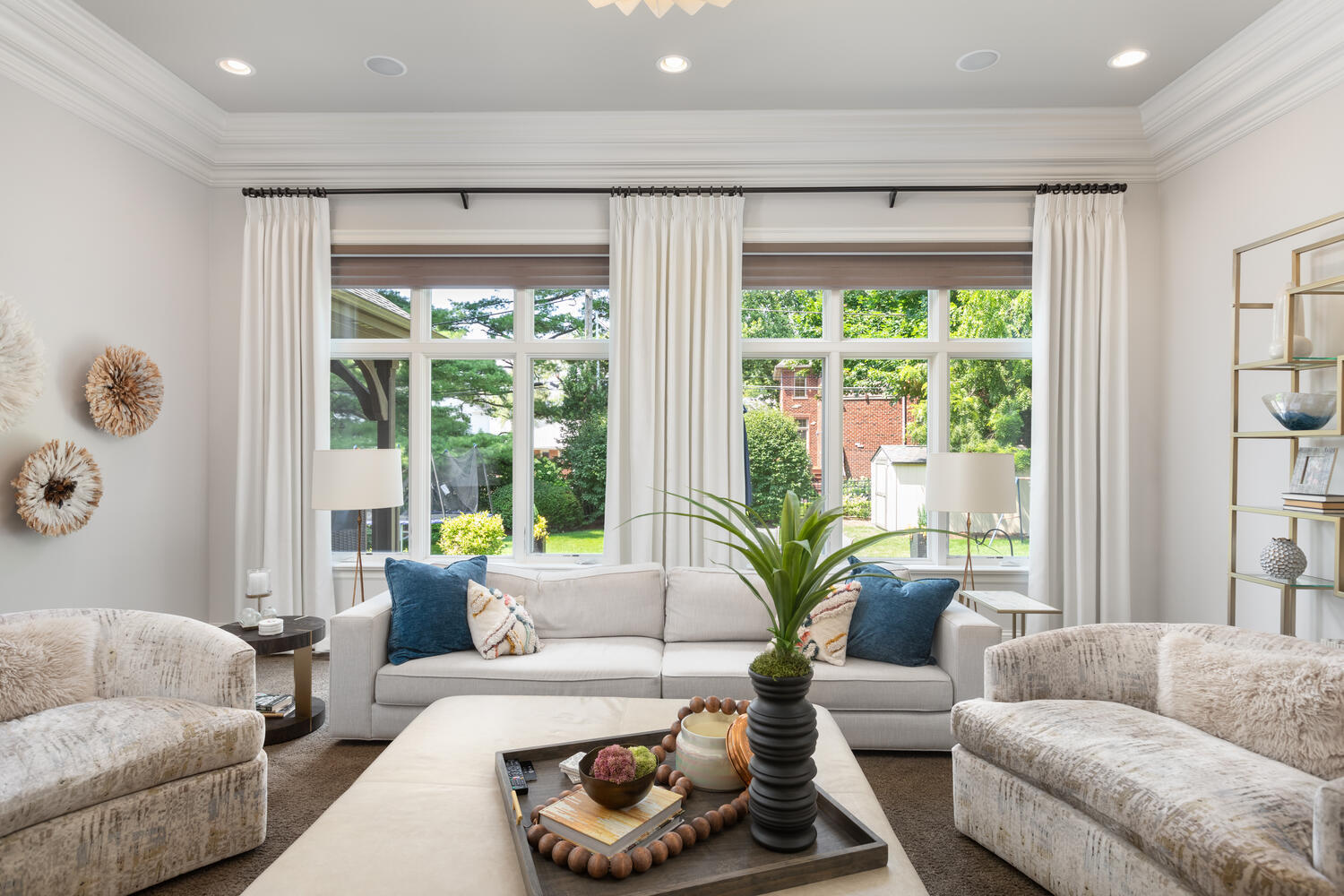 833 Wellner Road Naperville, IL 60540 - Photo 21 of 59 a living room with furniture and a large window