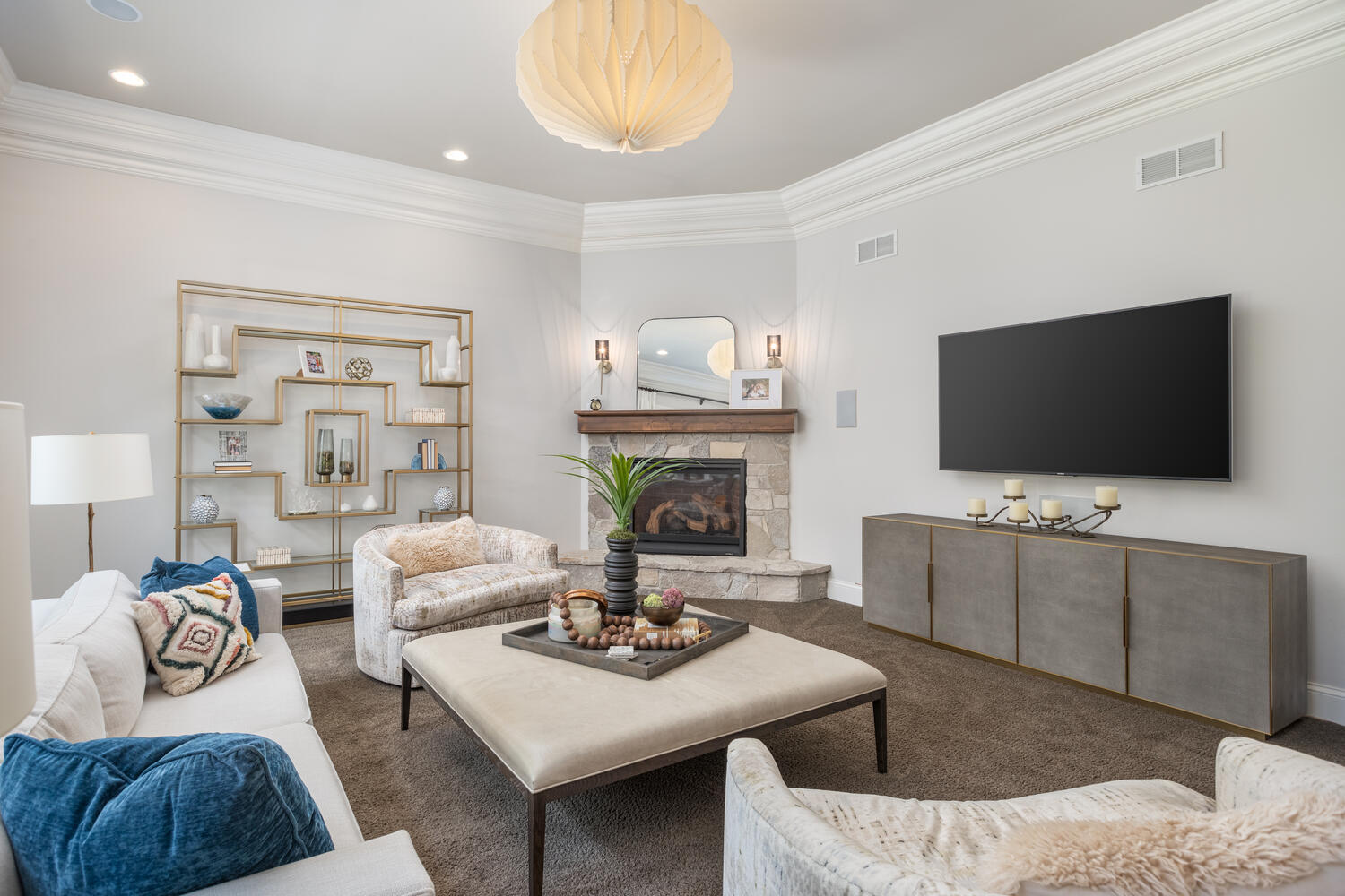 833 Wellner Road Naperville, IL 60540 - Photo 22 of 59 a living room with furniture and a flat screen tv