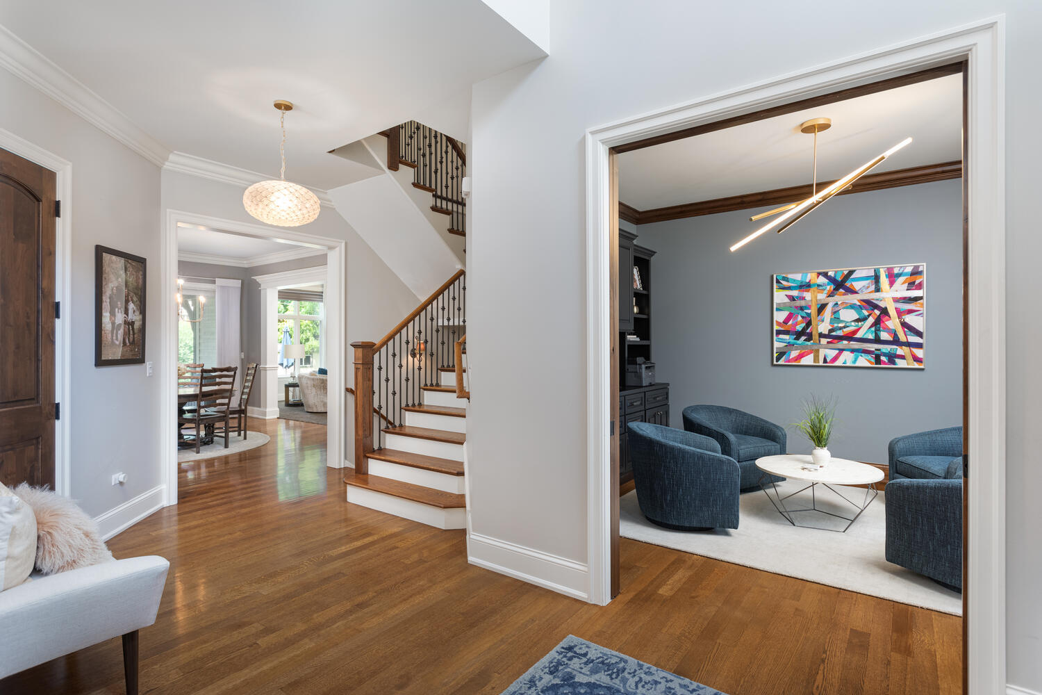 833 Wellner Road Naperville, IL 60540 - Photo 24 of 59 a living room with furniture and a wooden floor