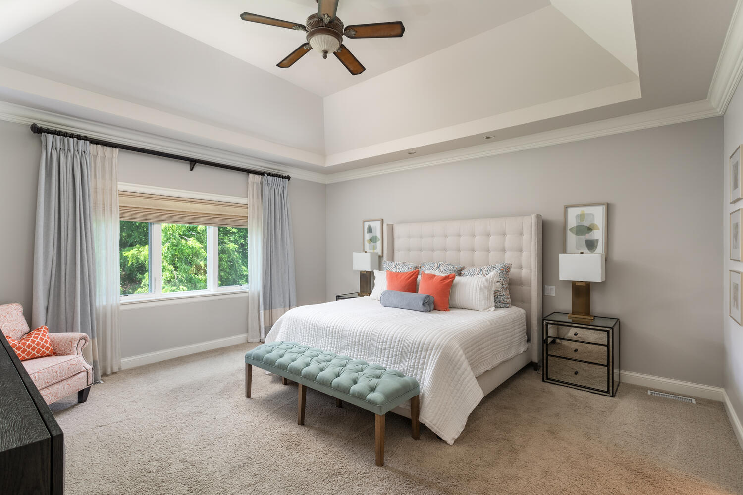 833 Wellner Road Naperville, IL 60540 - Photo 30 of 59 a bedroom with a bed and a chandelier