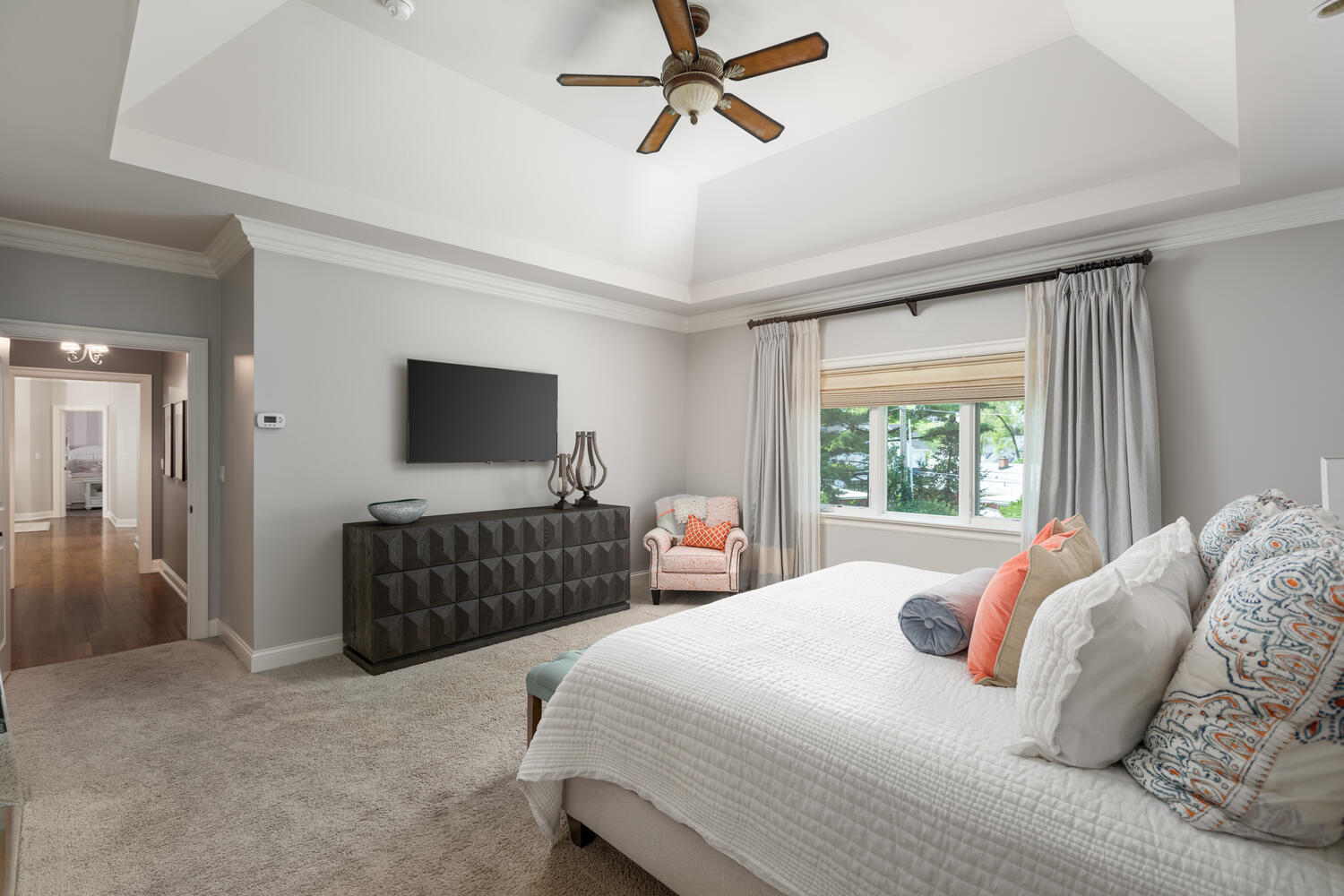 833 Wellner Road Naperville, IL 60540 - Photo 31 of 59 a bedroom with a bed and a flat screen tv