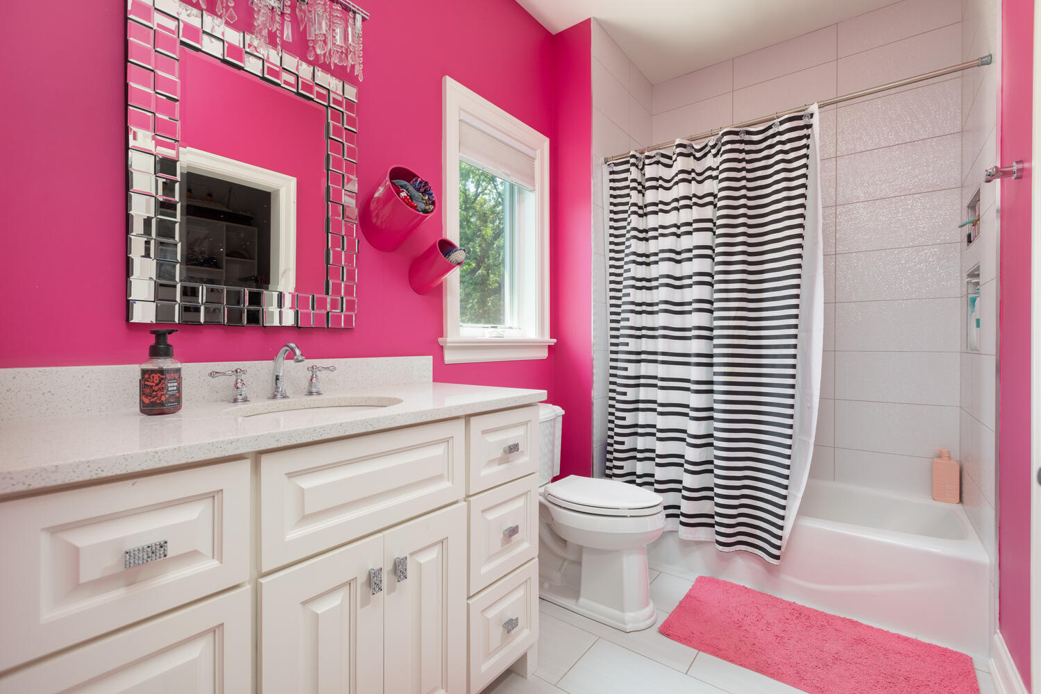 833 Wellner Road Naperville, IL 60540 - Photo 39 of 59 a bathroom with a sink a toilet and a large mirror
