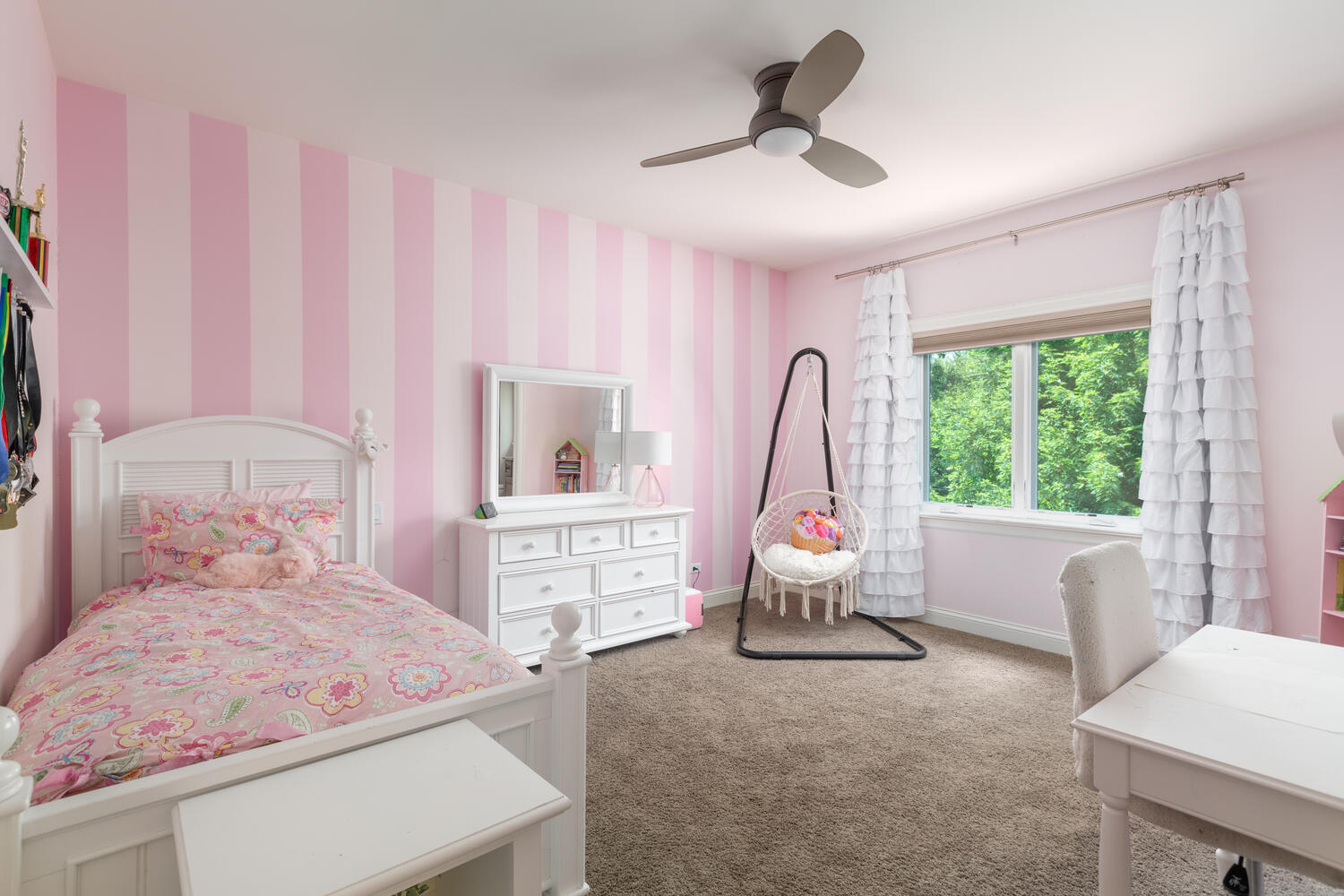 833 Wellner Road Naperville, IL 60540 - Photo 42 of 59 a bedroom with a bed and a large window