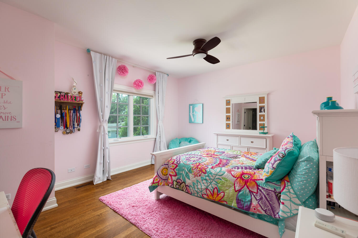 833 Wellner Road Naperville, IL 60540 - Photo 44 of 59 a bedroom with a bed and a couch