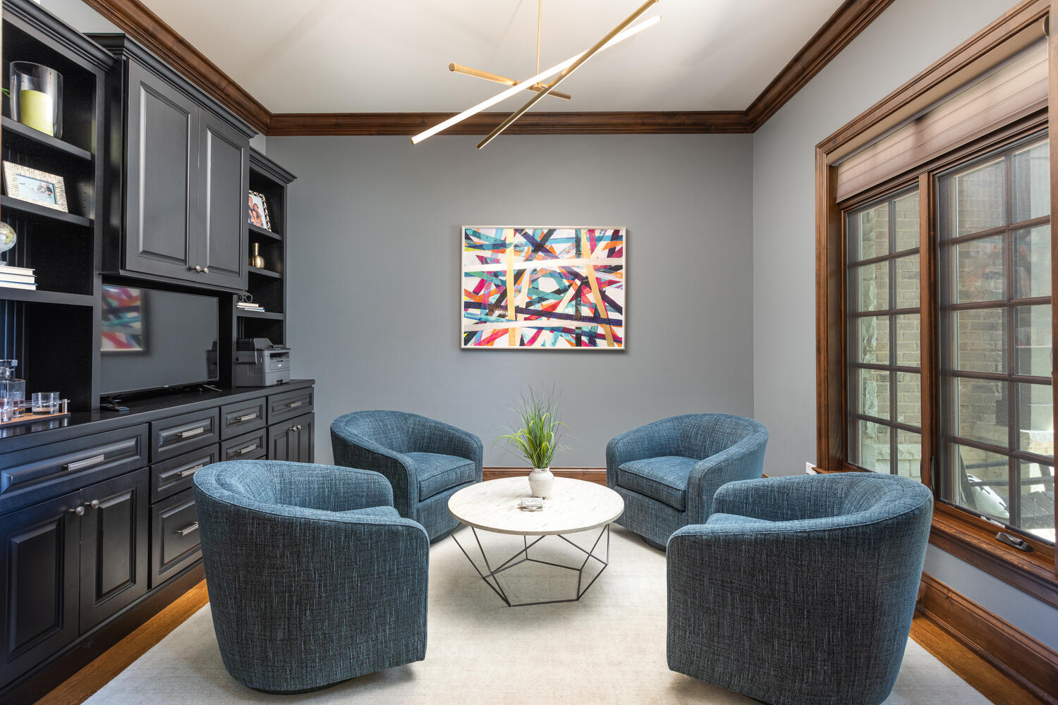 833 Wellner Road Naperville, IL 60540 - Photo 5 of 59 a living room with furniture and a floor to ceiling window