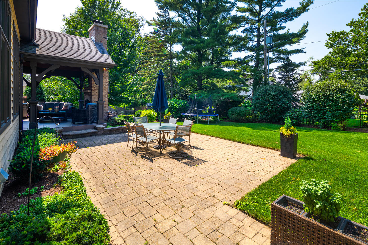 833 Wellner Road Naperville, IL 60540 - Photo 51 of 59 a view of a backyard with sitting area and garden