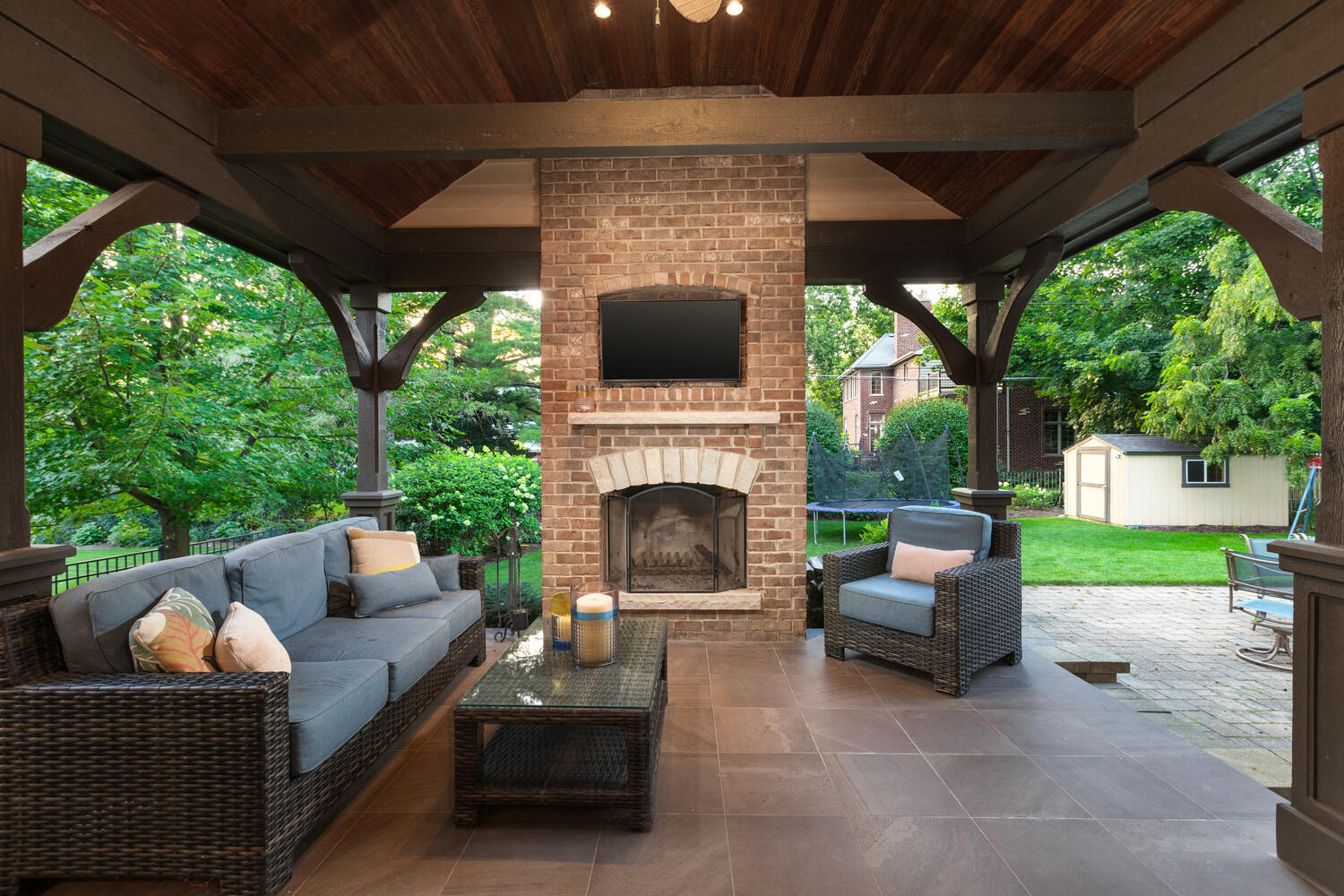 833 Wellner Road Naperville, IL 60540 - Photo 52 of 59 a living room with furniture and a fireplace