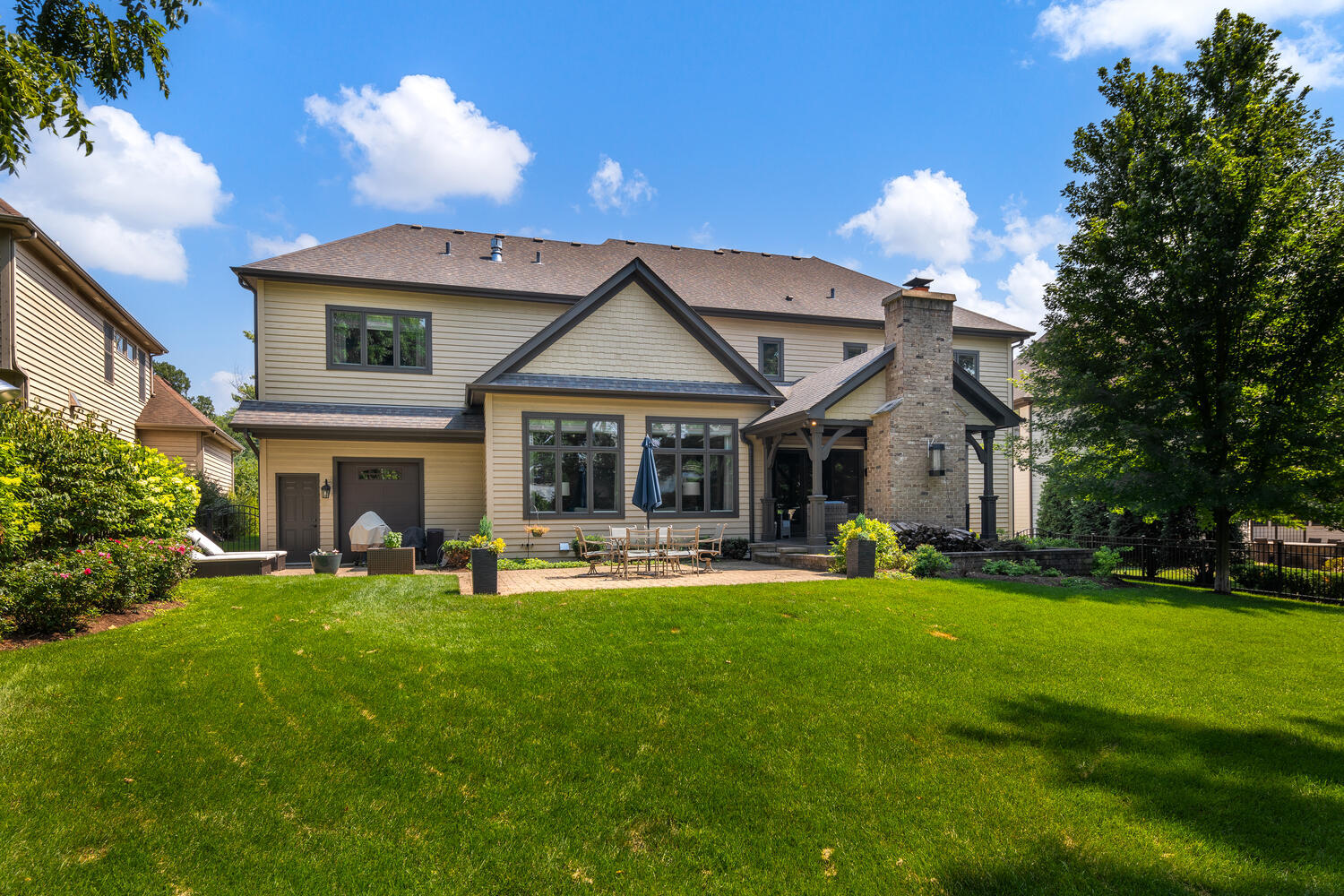 833 Wellner Road Naperville, IL 60540 - Photo 58 of 59 a front view of a house with swimming pool having outdoor seating
