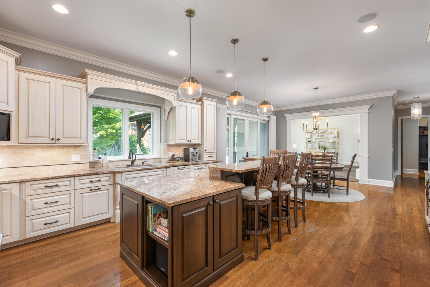 833 Wellner Road Naperville, IL 60540 - Photo 9 of 59 a kitchen with lots of counter space and wooden floor