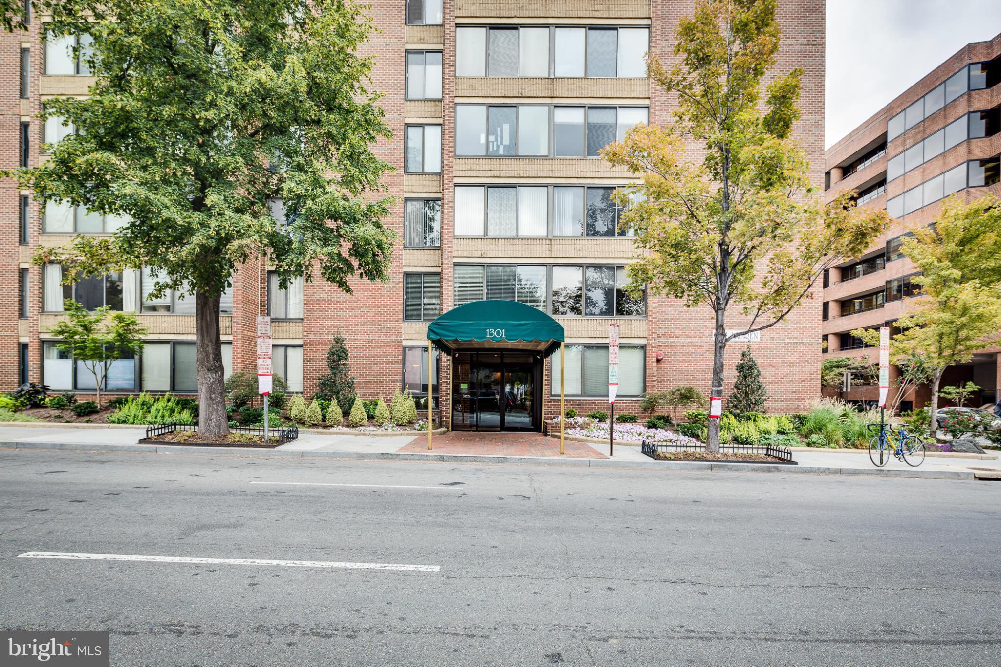 1301 20th Street Northwest, Unit 117 Washington, DC 20036 - Photo 2 of 16 a view of a building with a street
