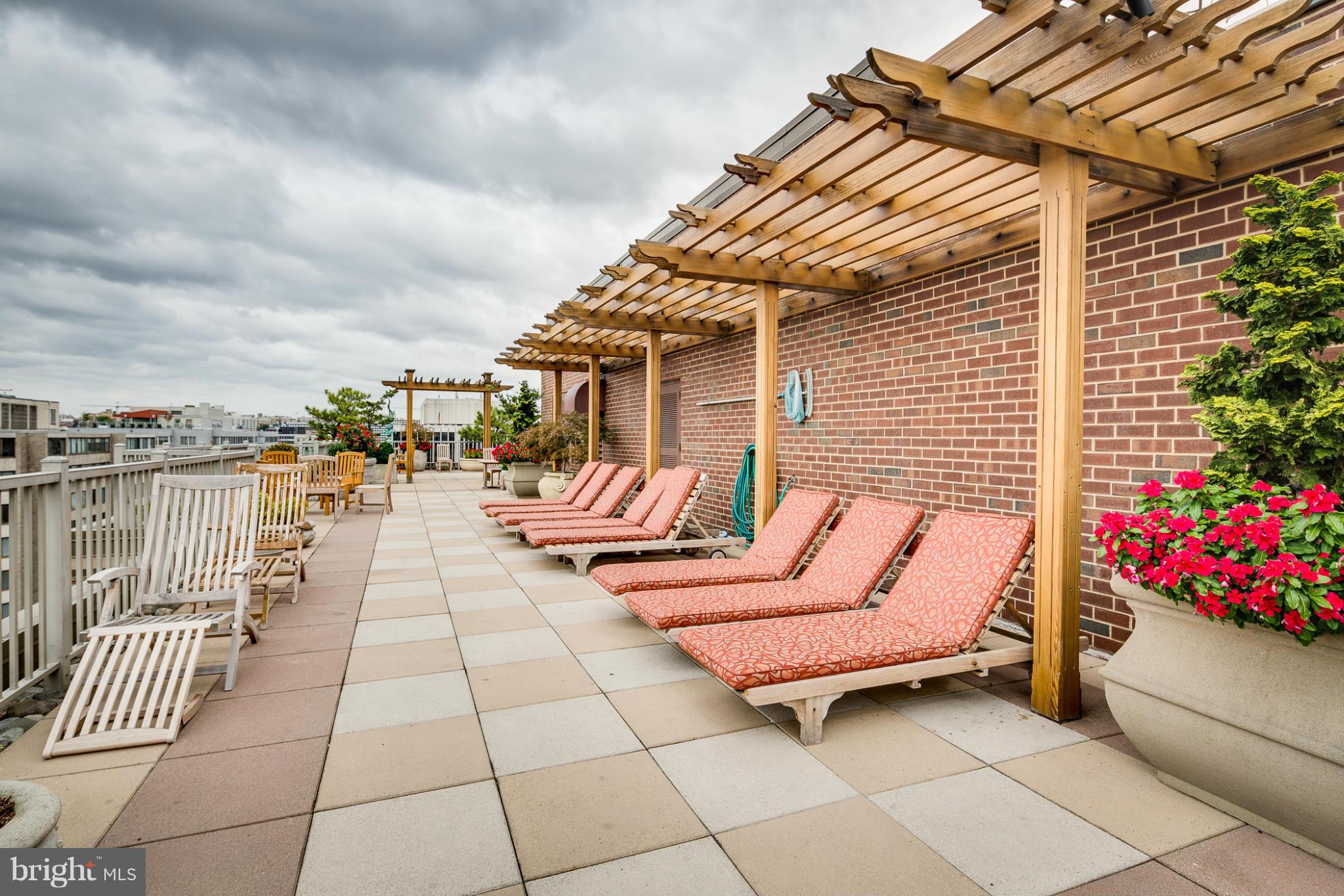 1301 20th Street Northwest, Unit 117 Washington, DC 20036 - Photo 12 of 16 a view of a terrace with furniture