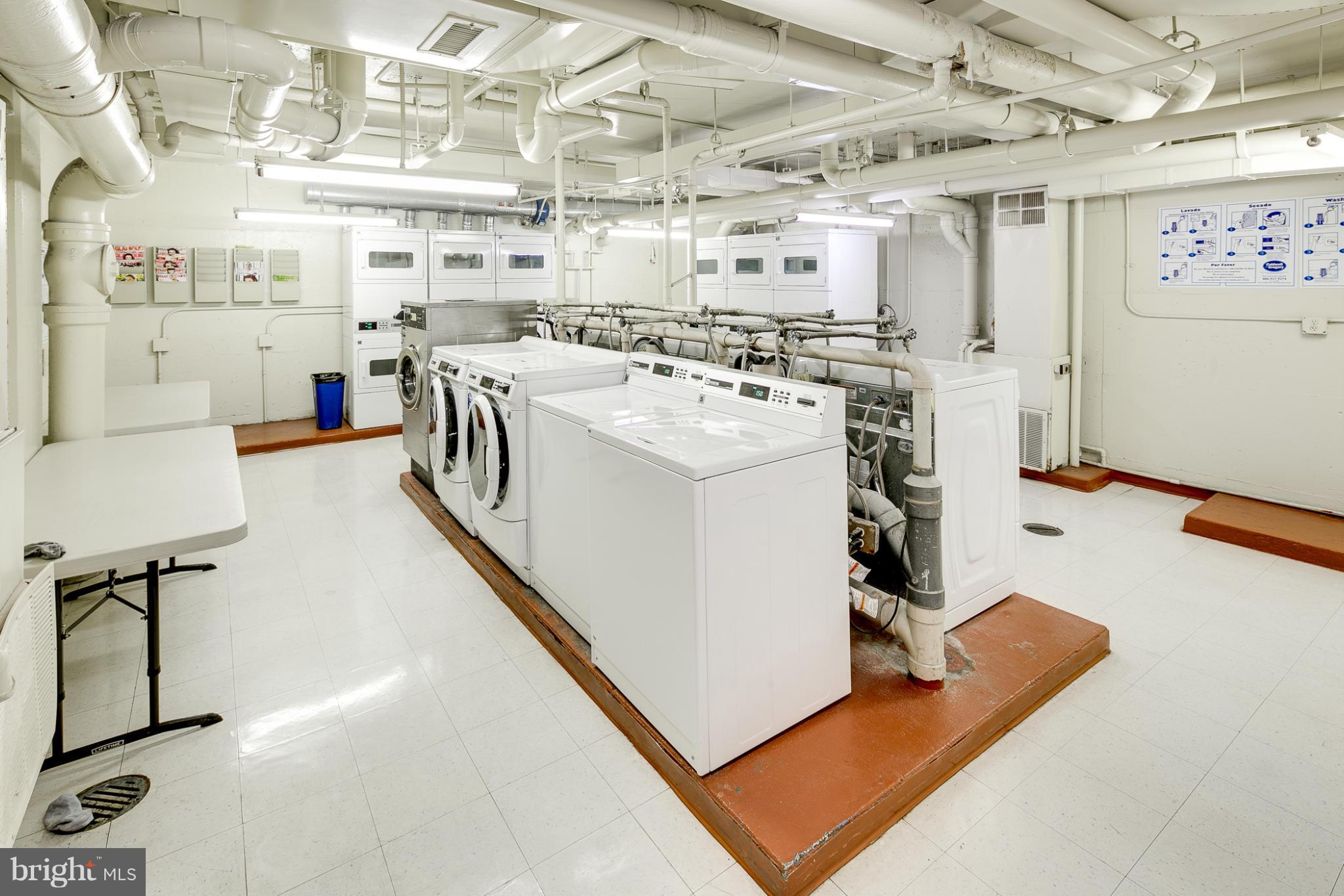 1301 20th Street Northwest, Unit 117 Washington, DC 20036 - Photo 13 of 16 a utility room with dryer and washer