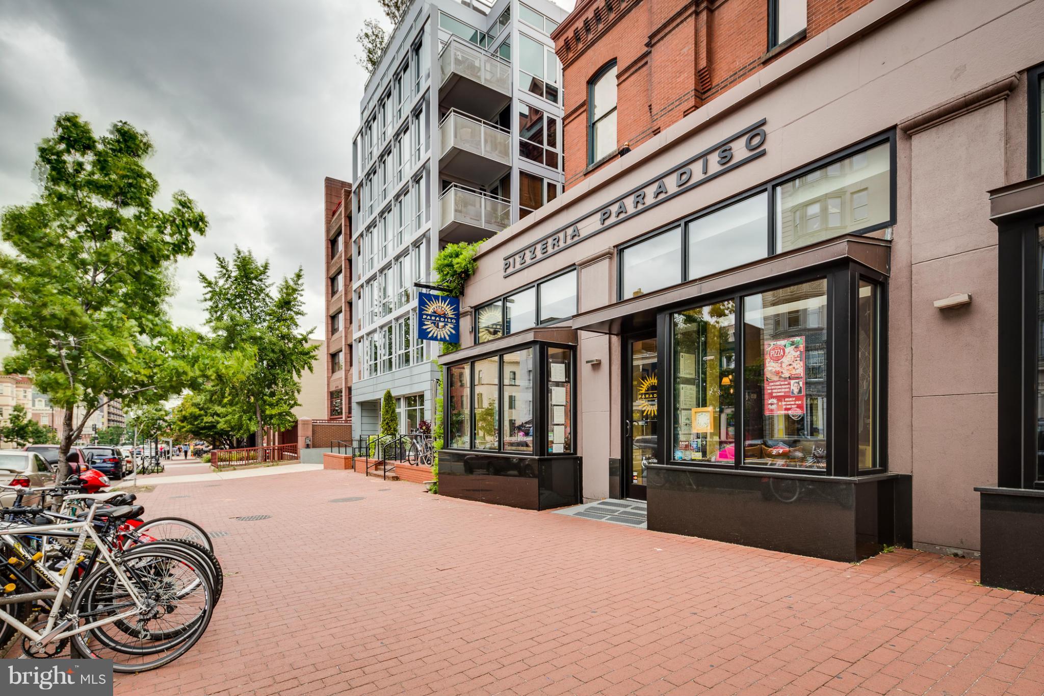 1301 20th Street Northwest, Unit 117 Washington, DC 20036 - Photo 14 of 16 a view of a building with traffic signal lights