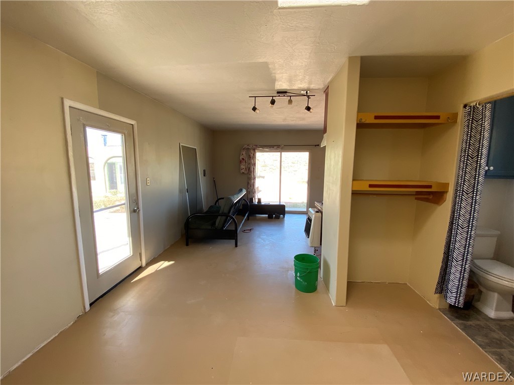 9095 Elliott Ridge Road Kingman, AZ 86401 - Photo 7 of 54 a view of a livingroom with furniture and a window