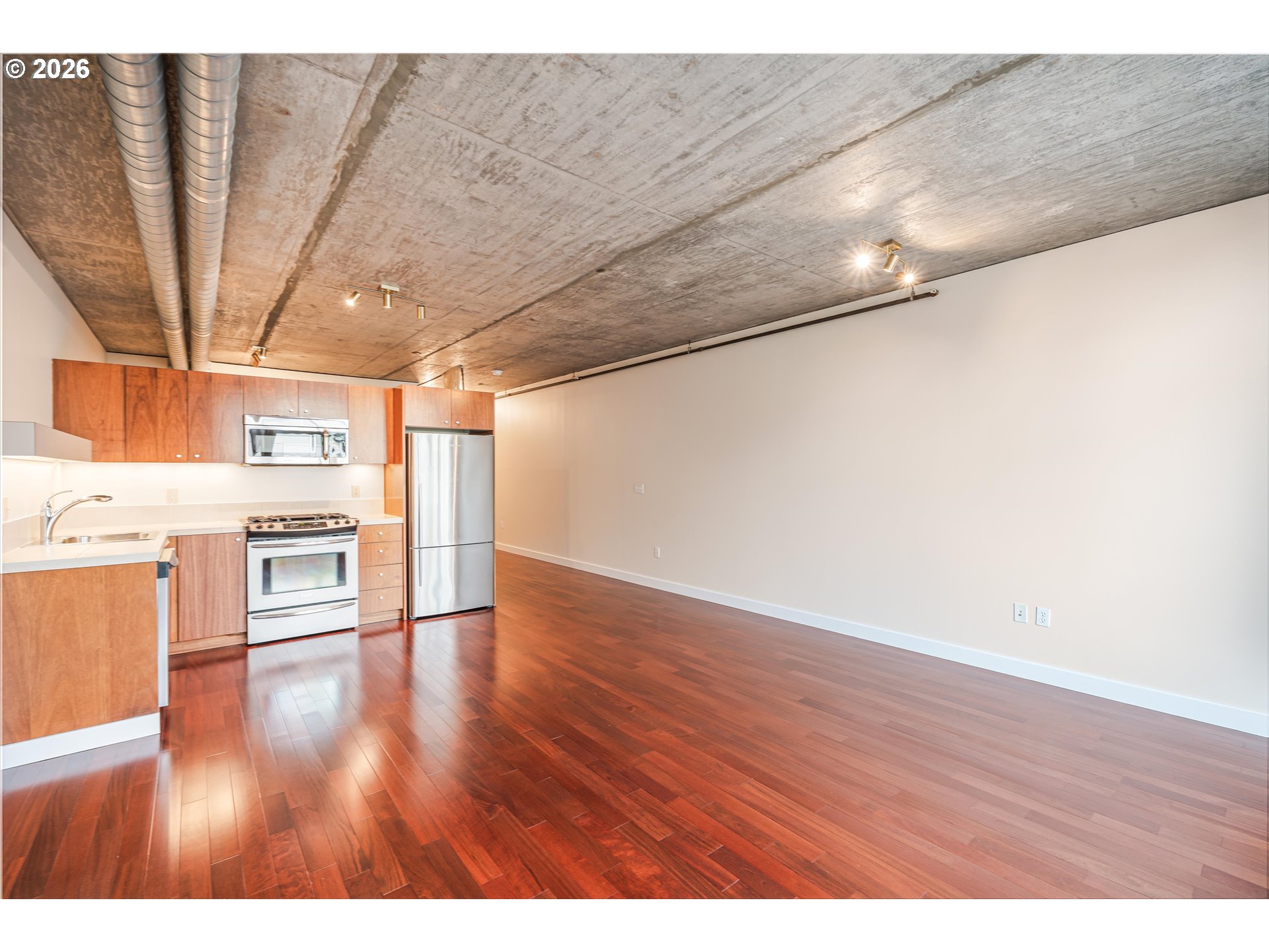 1926 West Burnside Street, Unit 512 Portland, OR 97209 - Photo 13 of 18 a view of a room with wooden floor