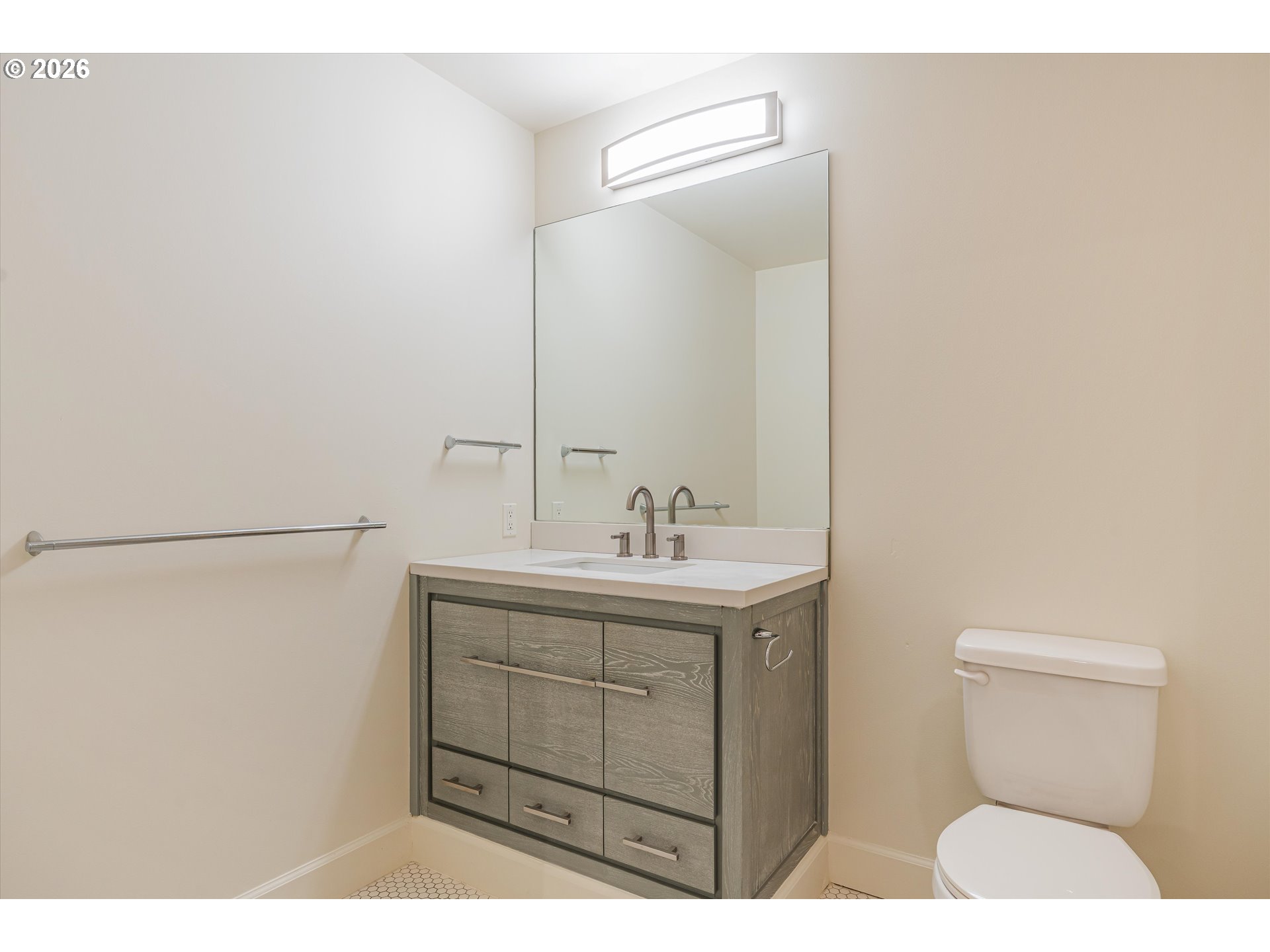 1926 West Burnside Street, Unit 512 Portland, OR 97209 - Photo 4 of 18 a bathroom with a sink toilet and vanity