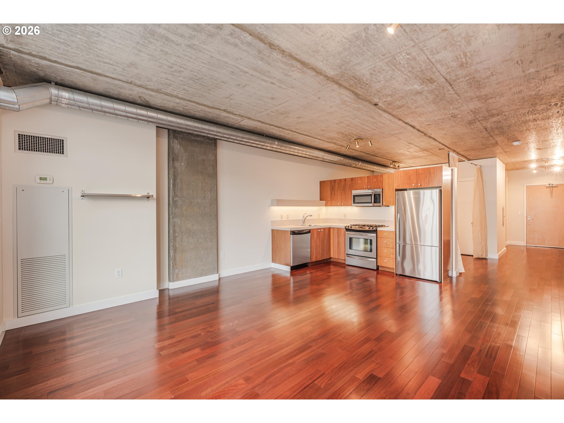 1926 West Burnside Street, Unit 512 Portland, OR 97209 - Photo 8 of 18 a view of a livingroom with wooden floor