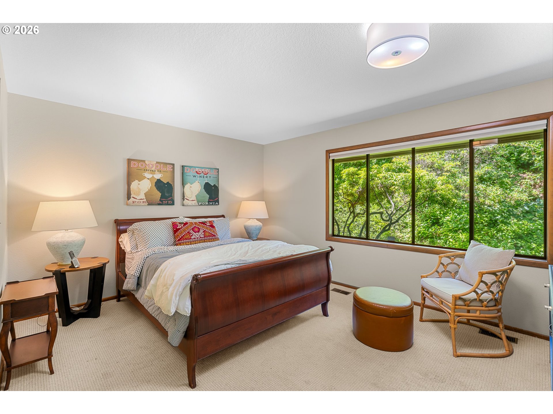 77 Condolea Way Lake Oswego, OR 97035 - Photo 10 of 25 a bedroom with furniture and a large window
