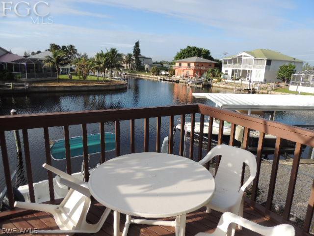 3197 Stabile Road St. James City, FL 33956 - Photo 12 of 17 a view of a chairs and table in patio