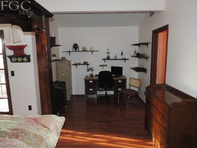 3197 Stabile Road St. James City, FL 33956 - Photo 17 of 17 a living room with furniture and a dining table