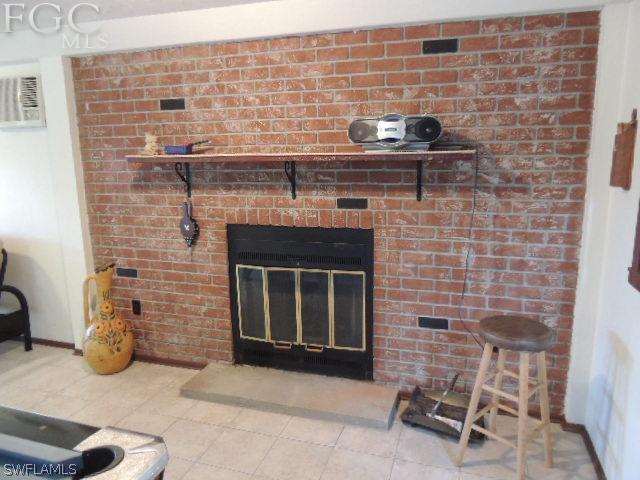 3197 Stabile Road St. James City, FL 33956 - Photo 5 of 17 a bathroom with a sink and a stove