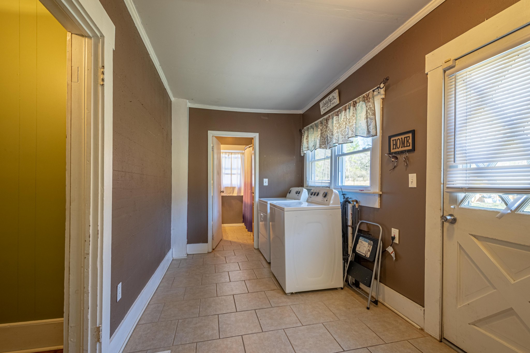 9263 Bethel Road Prospect, TN 38477 - Photo 16 of 45 a view of a storage & utility room with washer and dryer