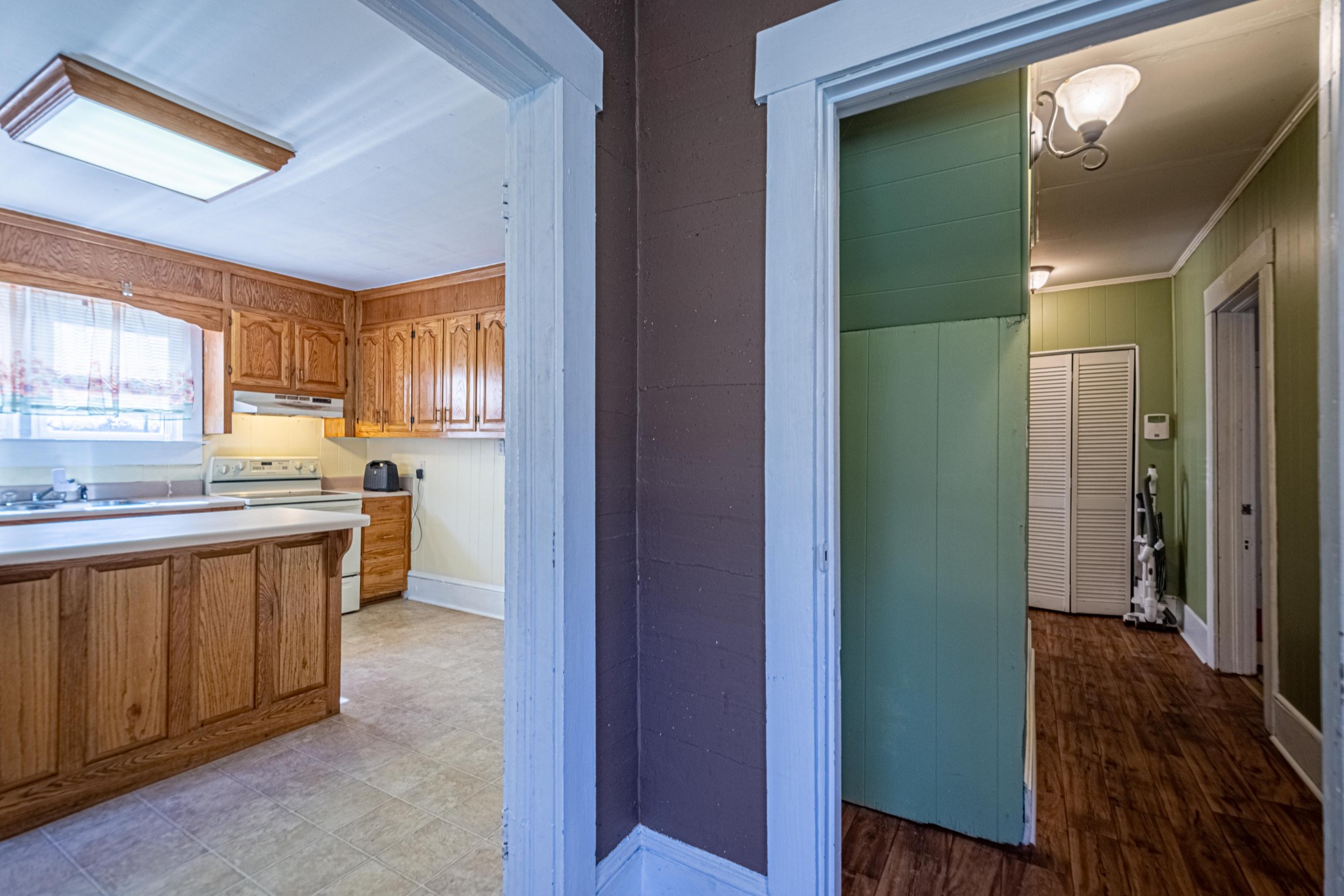 9263 Bethel Road Prospect, TN 38477 - Photo 18 of 45 a kitchen with a refrigerator and a sink