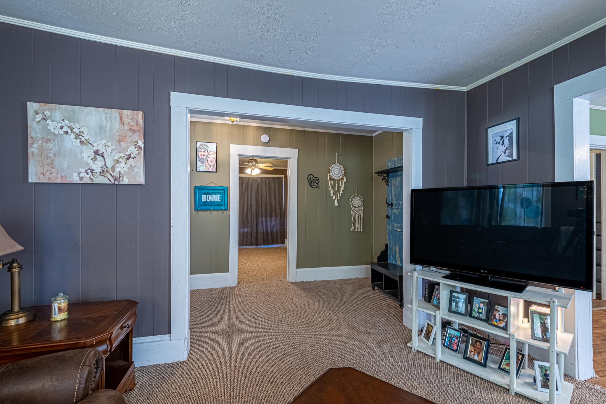9263 Bethel Road Prospect, TN 38477 - Photo 24 of 45 a living room with furniture and a flat screen tv
