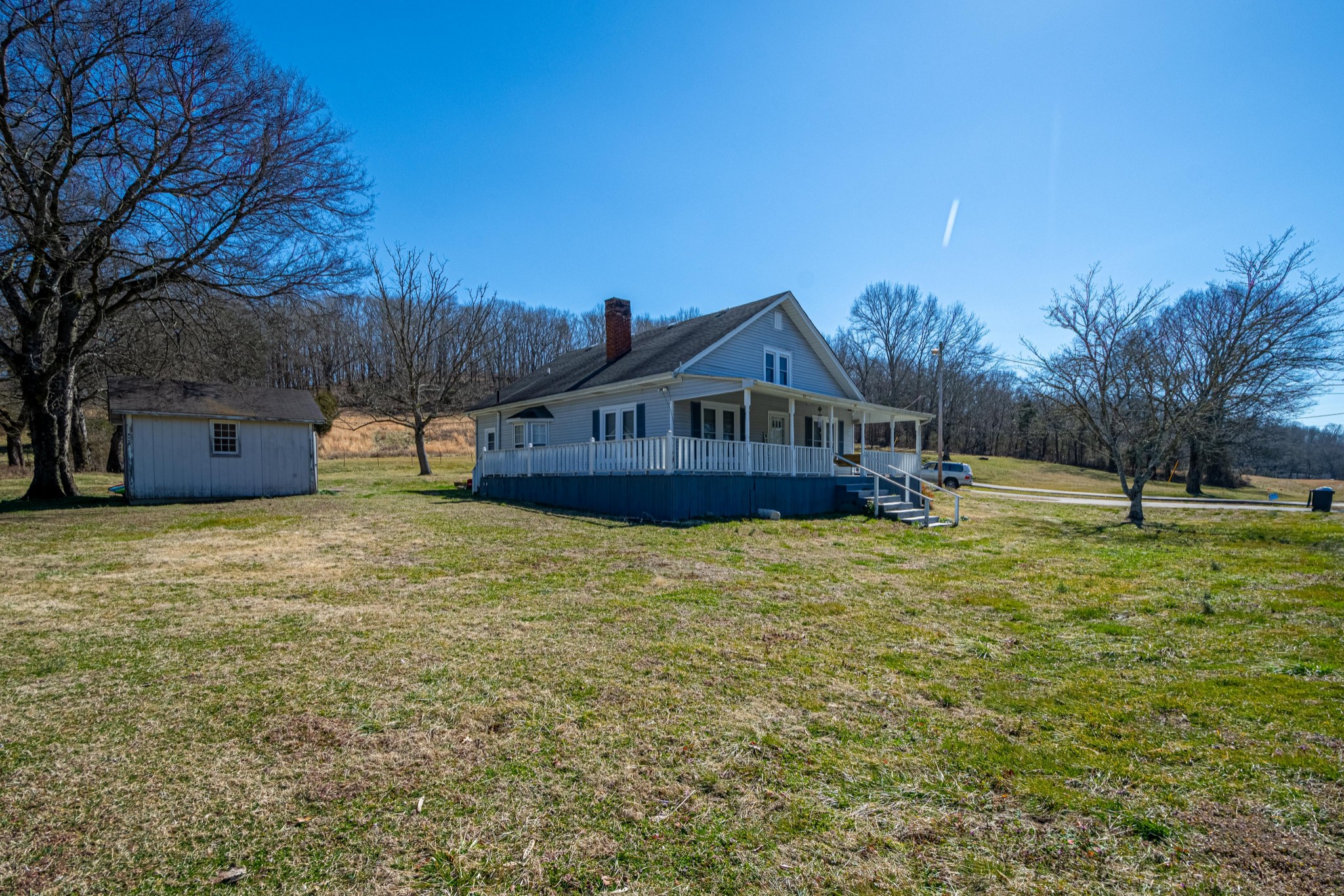 9263 Bethel Road Prospect, TN 38477 - Photo 43 of 45 a front view of a house with a yard