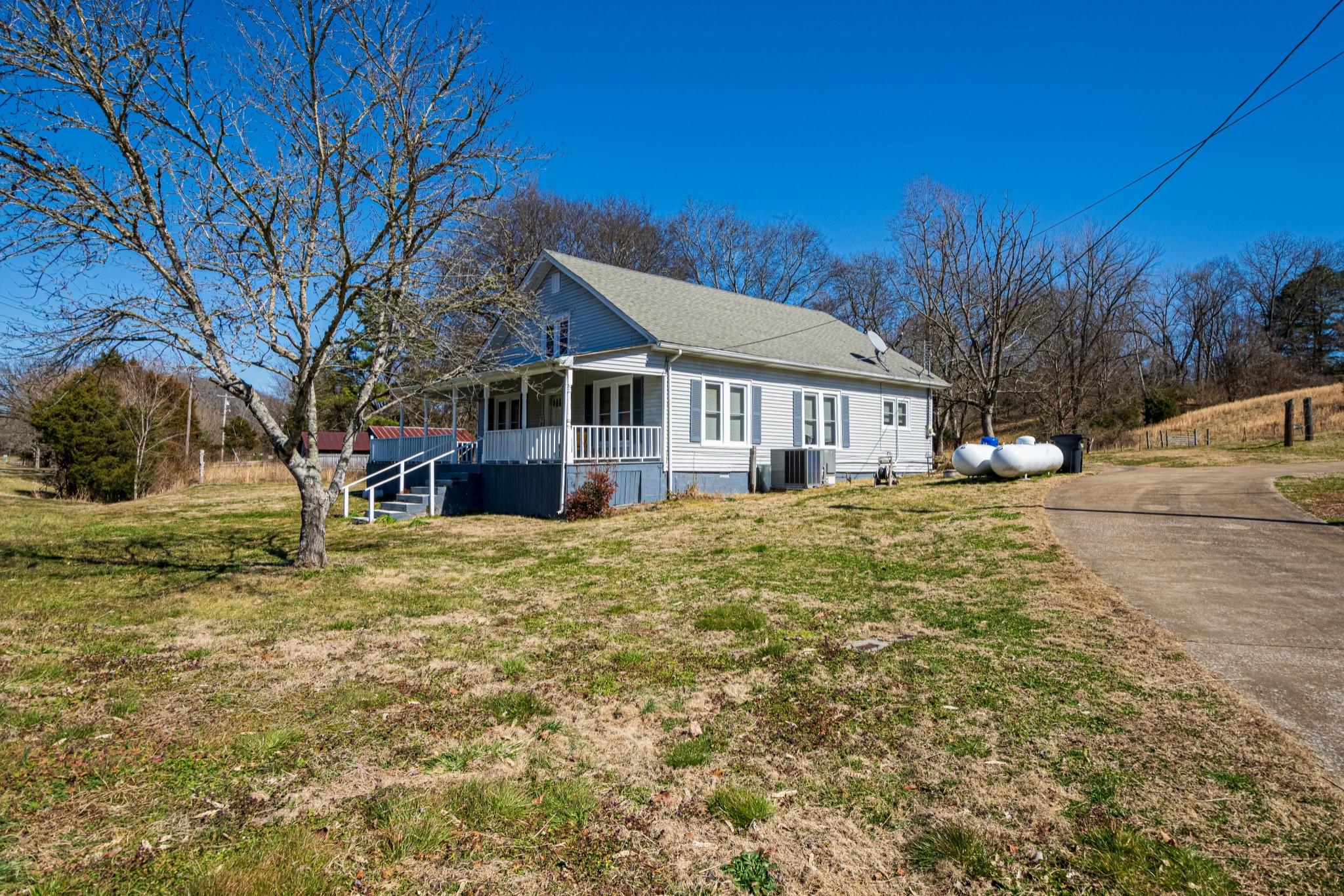 9263 Bethel Road Prospect, TN 38477 - Photo 44 of 45 a front view of a house with a yard