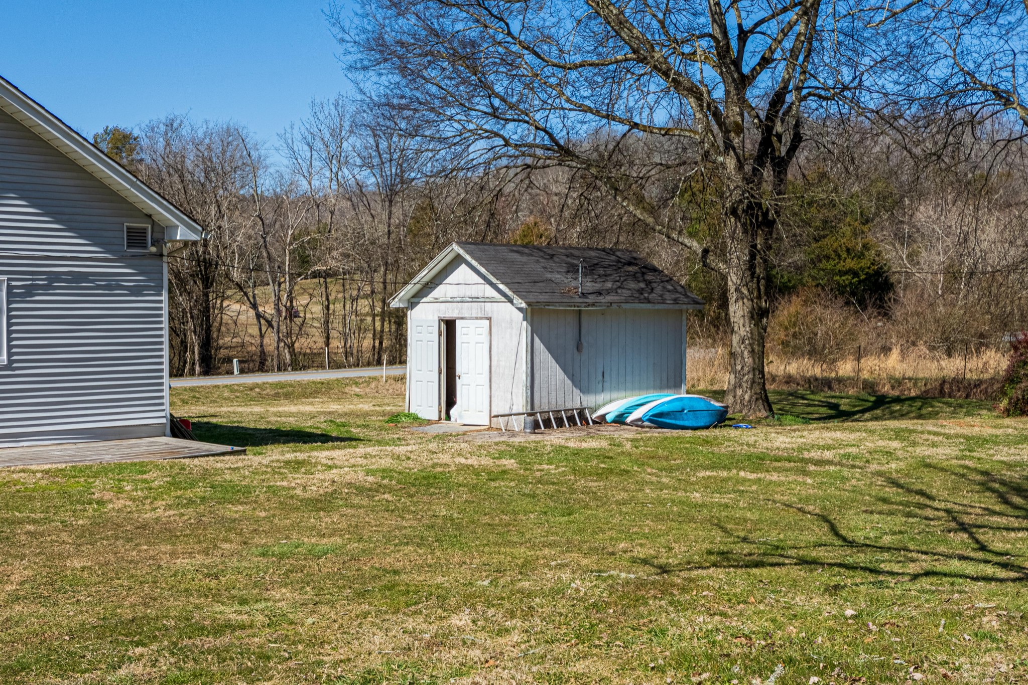 9263 Bethel Road Prospect, TN 38477 - Photo 45 of 45 a view of a house with a yard and garage