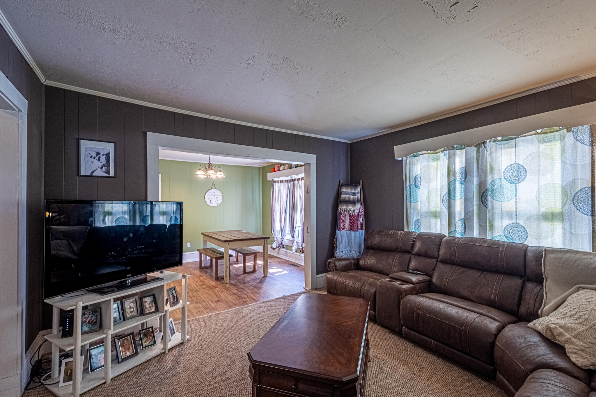 9263 Bethel Road Prospect, TN 38477 - Photo 6 of 45 a living room with furniture and a flat screen tv