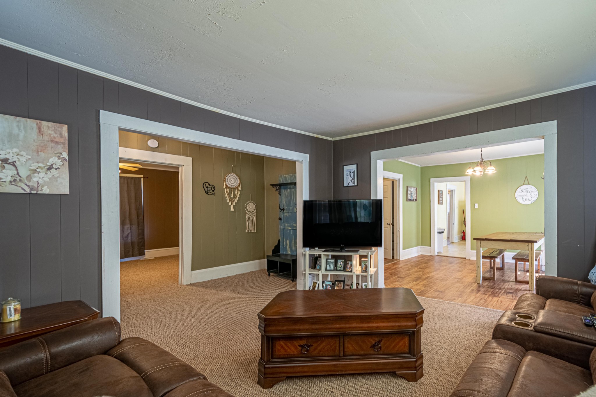 9263 Bethel Road Prospect, TN 38477 - Photo 7 of 45 a living room with furniture and a flat screen tv