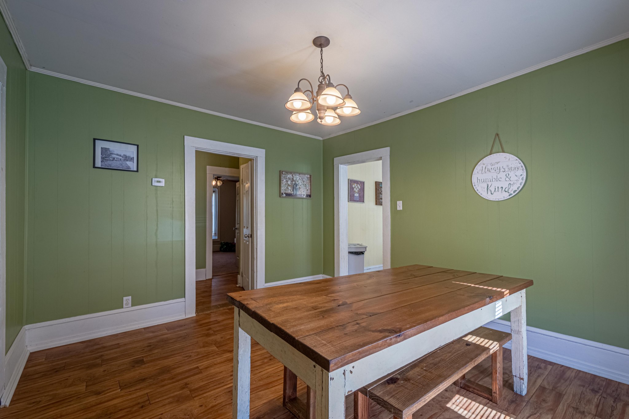 9263 Bethel Road Prospect, TN 38477 - Photo 9 of 45 a view of a room with a table chairs and wooden floor