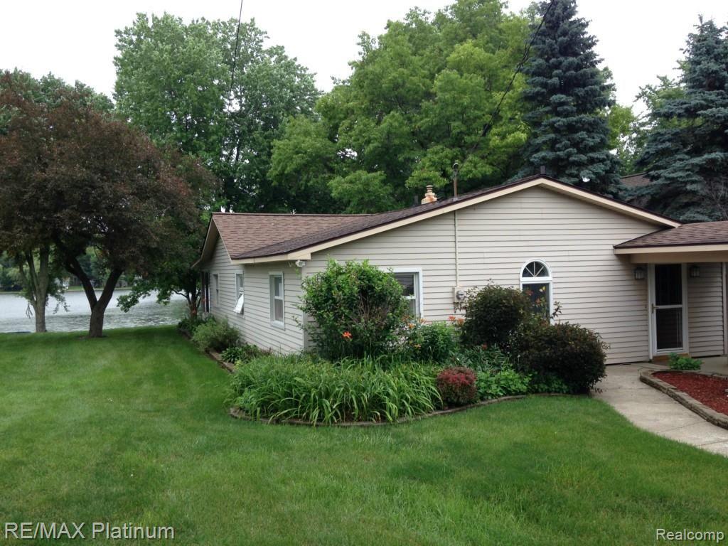 2979 Rubbins Road Howell, MI 48843 - Photo 9 of 17 Triangle Lake outside view 2.jpg