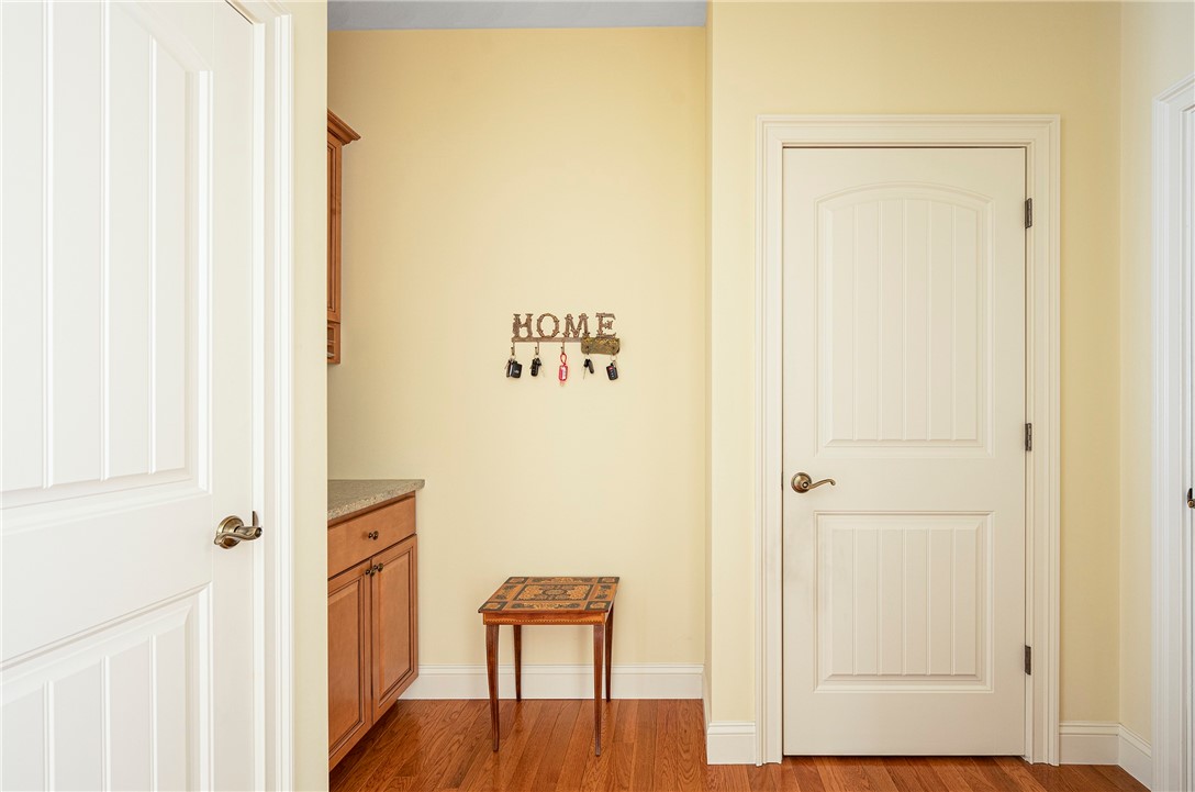 123 Whispering Pine Way Exeter, RI 02822 - Photo 21 of 29 Back hall area leads to basement and garage
