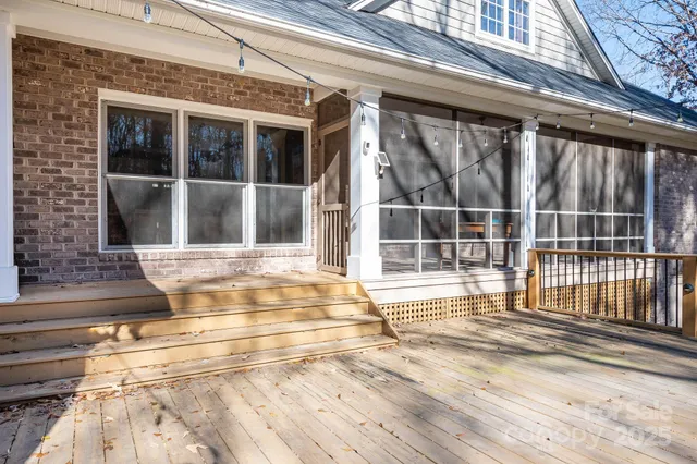 a view of a brick house with a large window