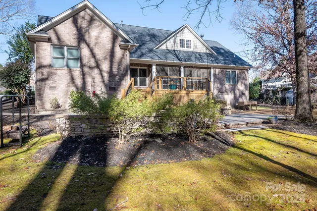 a view of a house with swimming pool