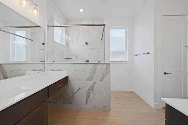 a bathroom with a sink and a mirror