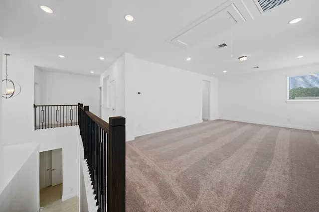 a view of hallway with stairs