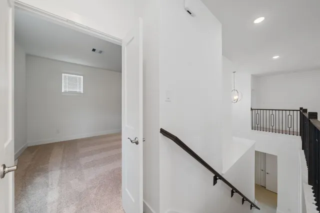 a view of a hallway with entryway